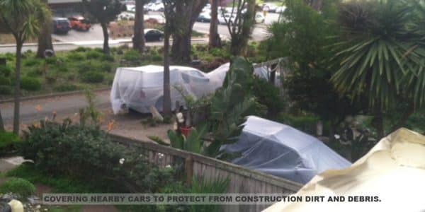 Armstrong Roofing - protection of cars near a home where spf roofing will be installed